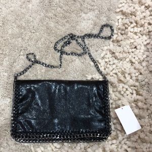 Leather and chain clutch with detachable strap